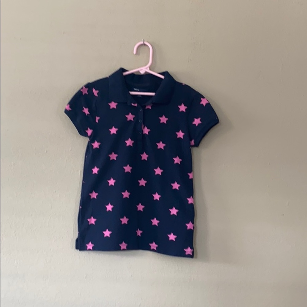 navy blue shirt with pink stars